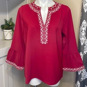 Red embroidered V neck blouse with 3/4 length sleeves